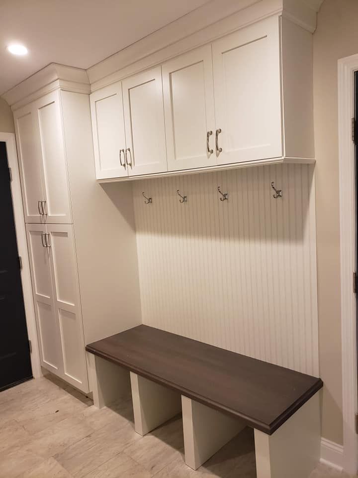 There is a bench in the middle of the room.