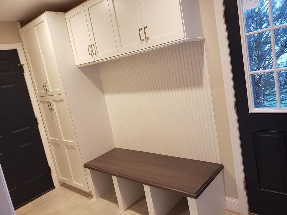 There is a bench in the middle of the room.