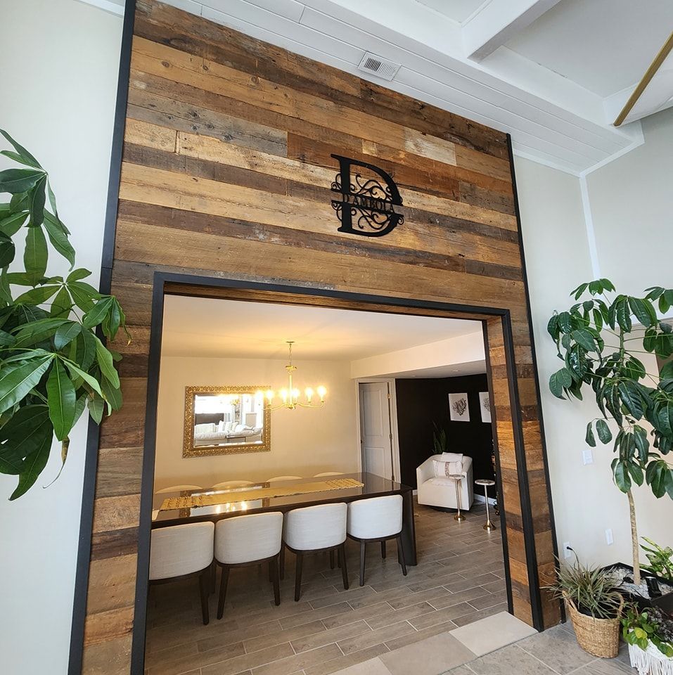 A wooden wall with a letter d on it