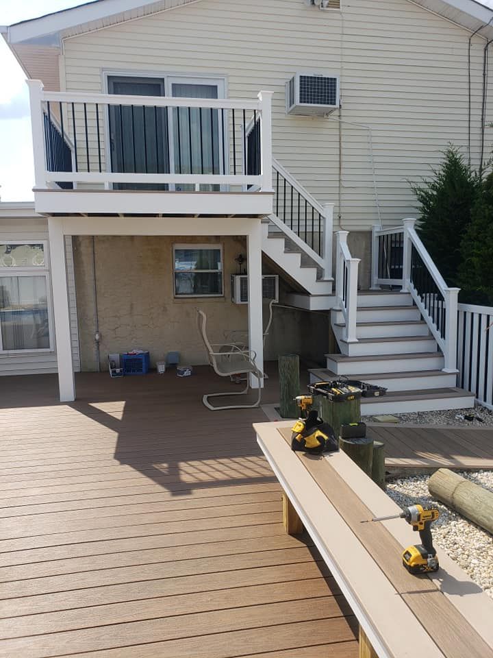 The back of a house with a deck and stairs