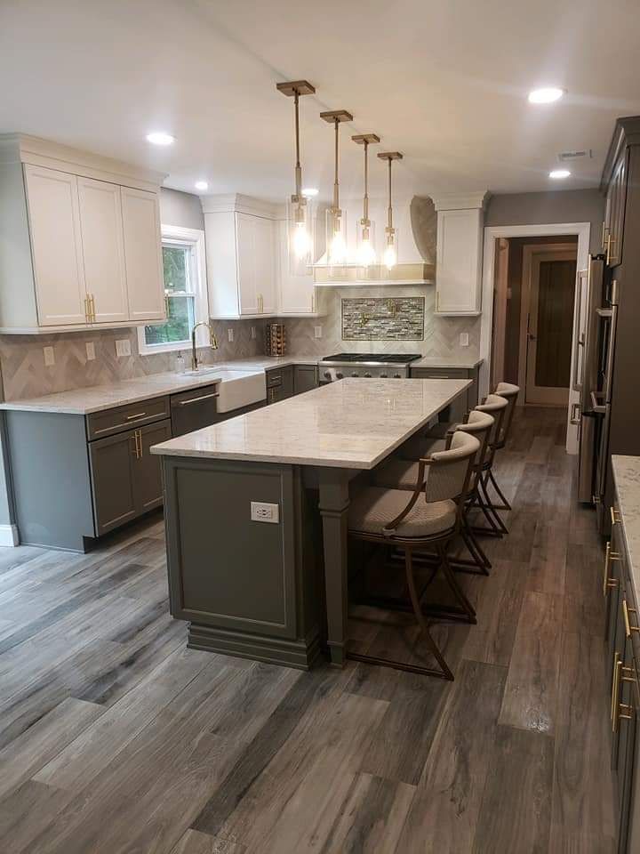 A large island in the middle of the kitchen