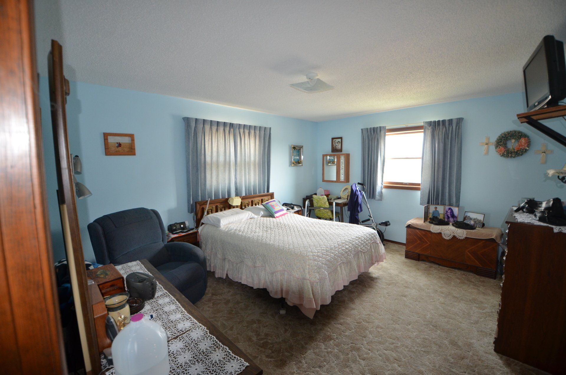 There is a large bed in the middle of the room.