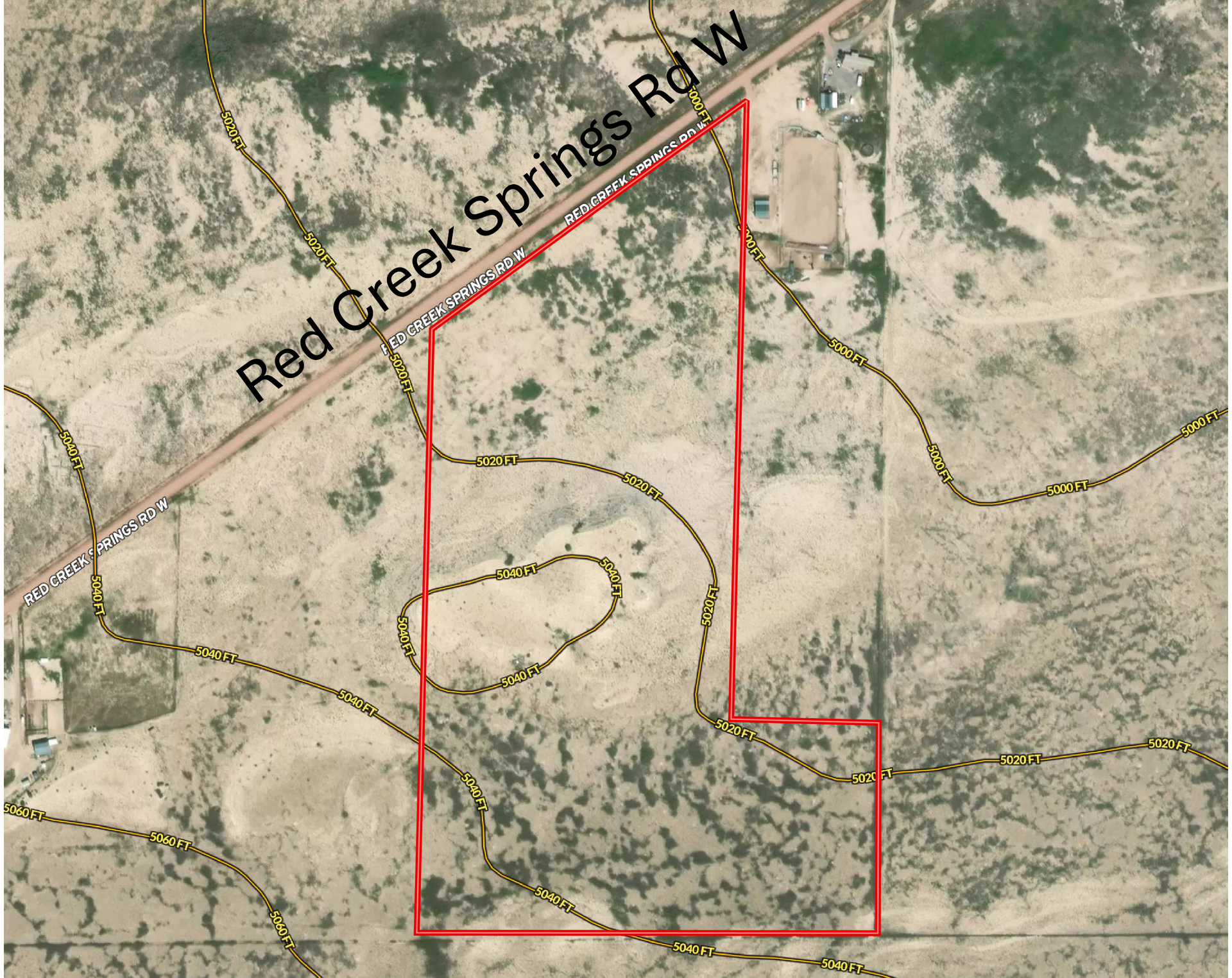 Aerial view of land, outlined in red. Red Creek Springs Rd W runs along the top.