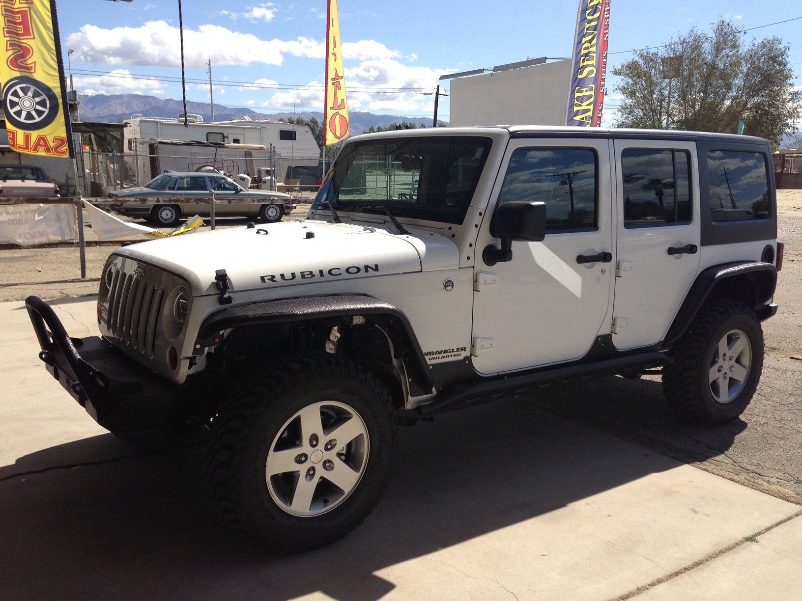 White and black Jeep vehicle