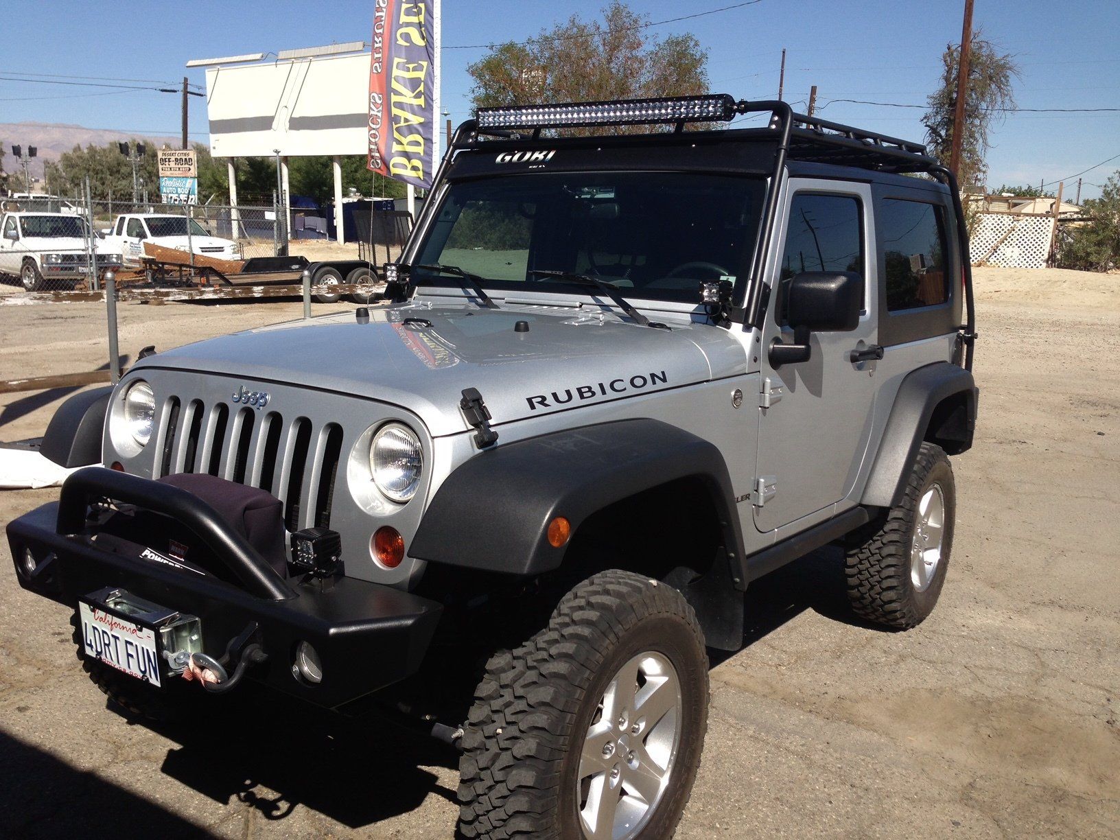 Metallic silver and black Jeep