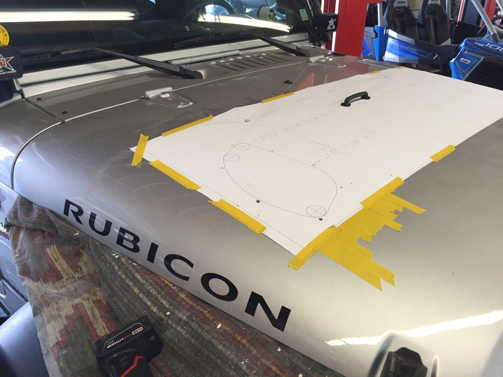 Jeep with paper and tape