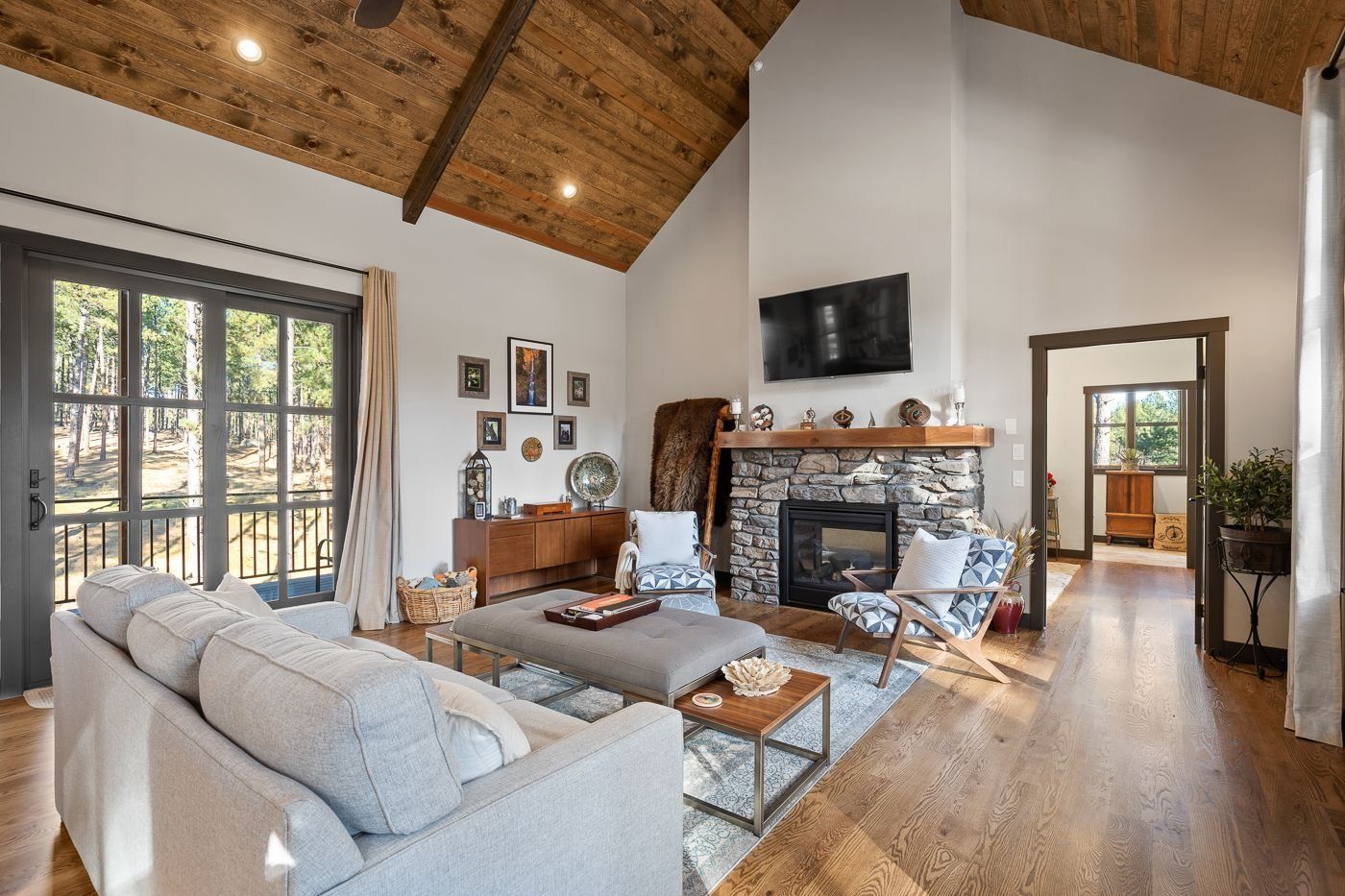 A living room filled with furniture and a fireplace.