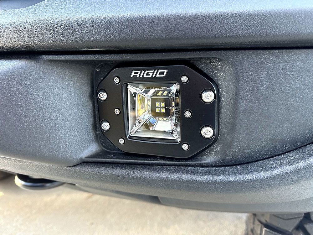 Black Rigd light mounted on a black bumper.