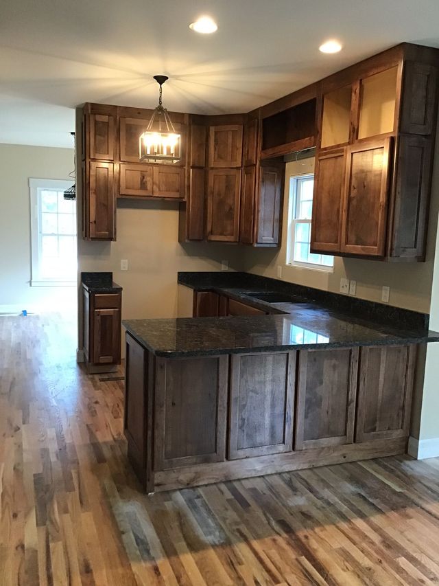 Rustic Traditional Kitchen Remodel by Bluegrass Marble & Granite project photo
