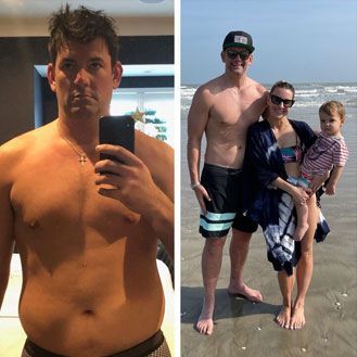A man is taking a picture of himself and a woman is holding a baby on the beach.