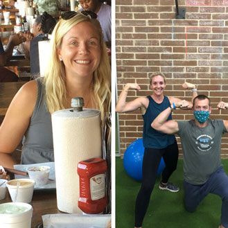 A woman is sitting at a table with a paper towel roll and a man is flexing his muscles.