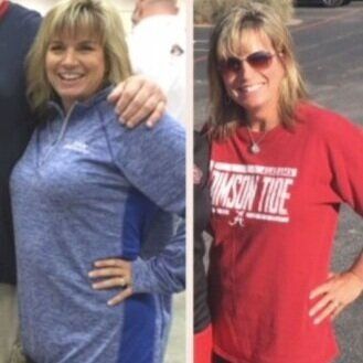 A woman is wearing a crimson tide shirt