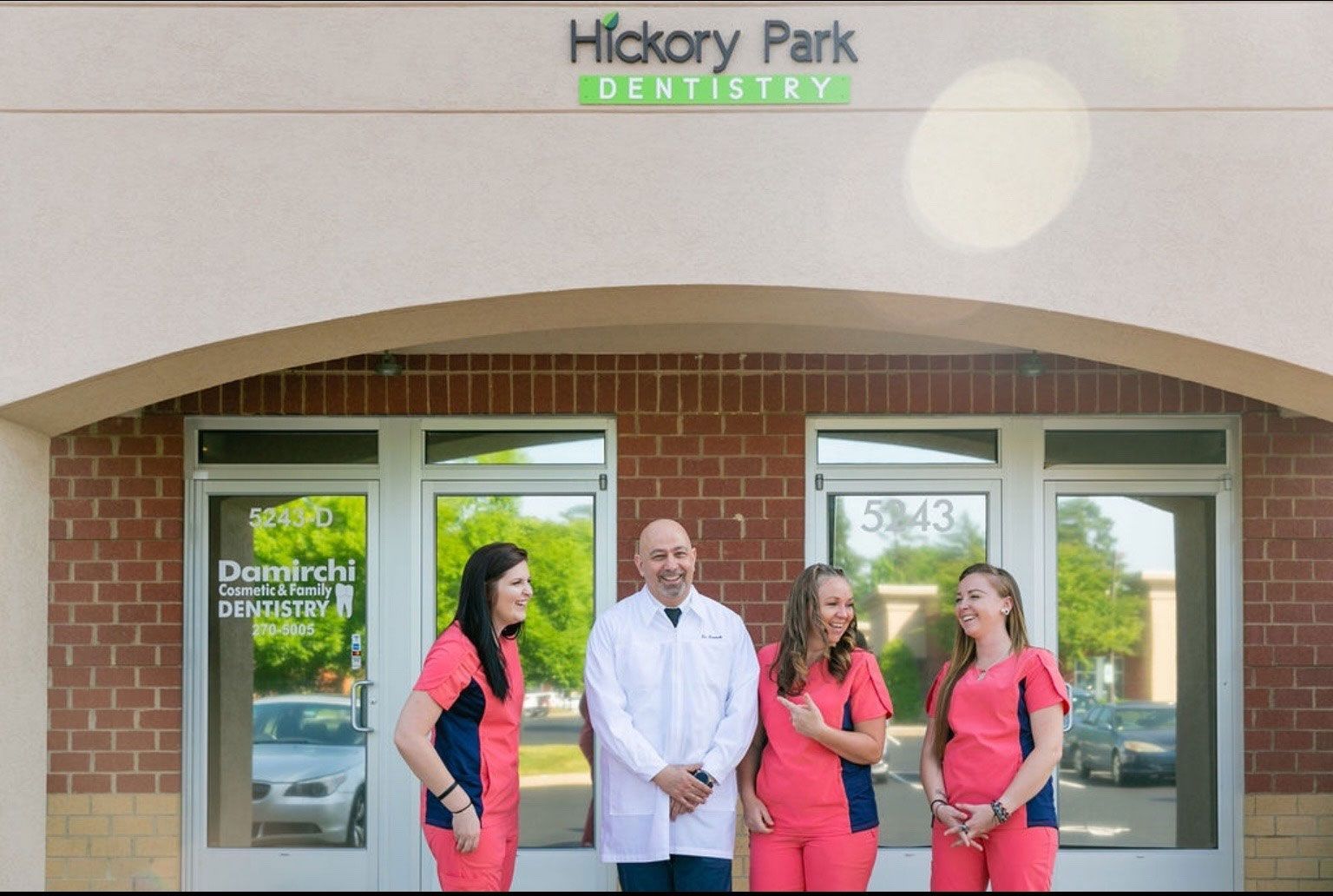 Hickory Park Dentistry: Dental team stands in front of their office.