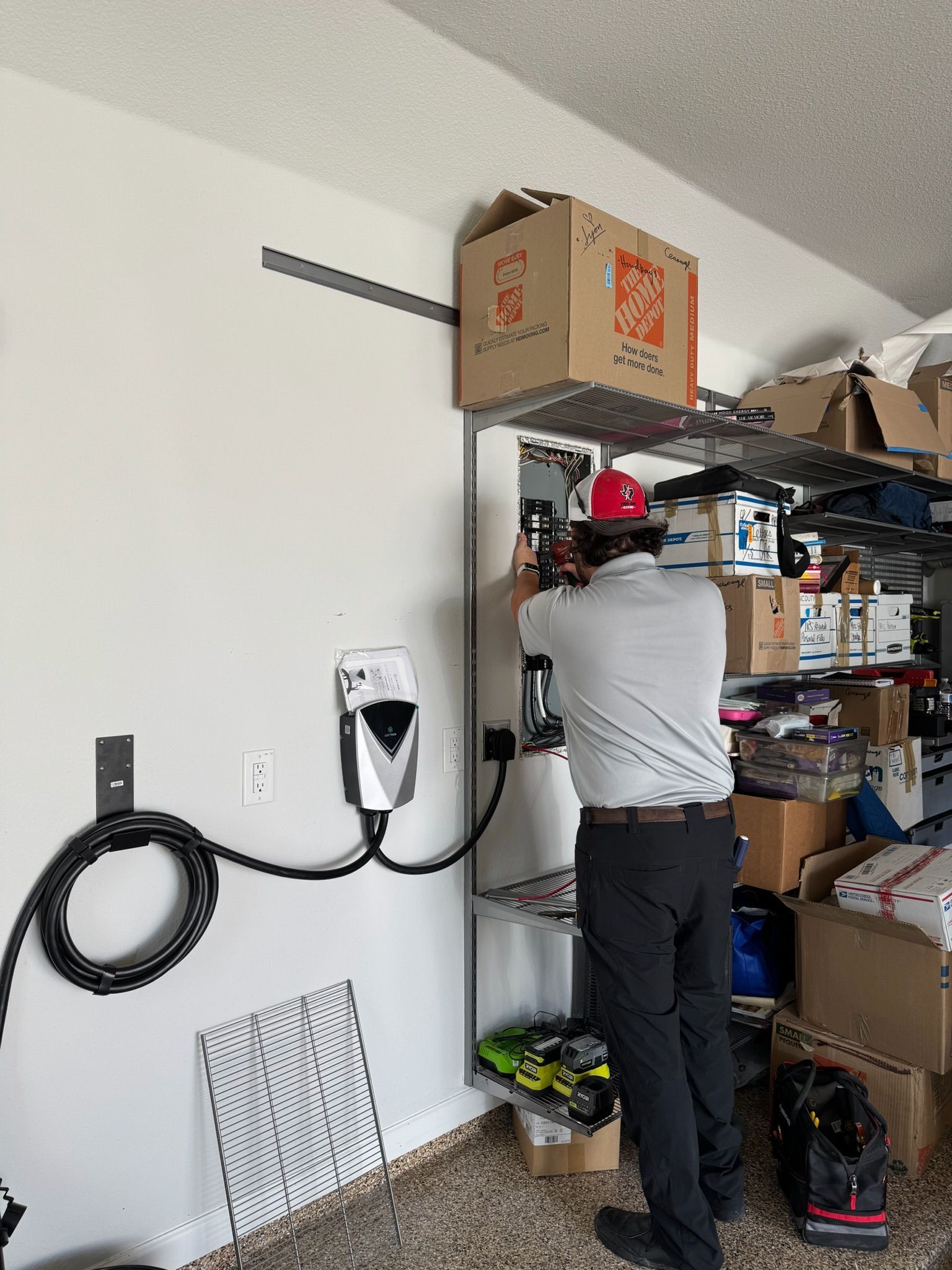 At-home electric vehicle charger installation completed by Tier One Electric in Highland Village, TX, providing convenient and reliable vehicle charging. Residential EV charger installation by Tier One Electric in Highland Village, TX