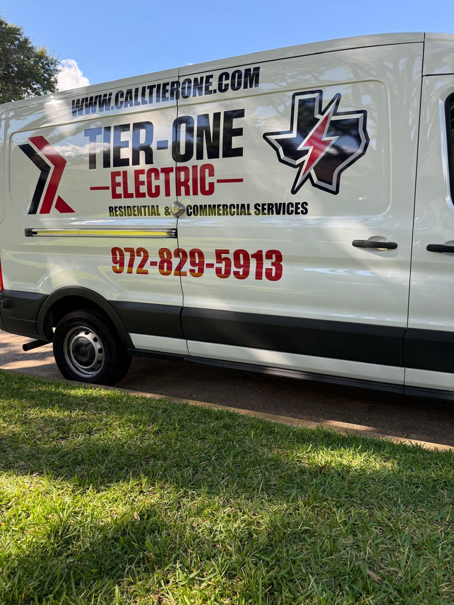 White Tier-One Electric van.