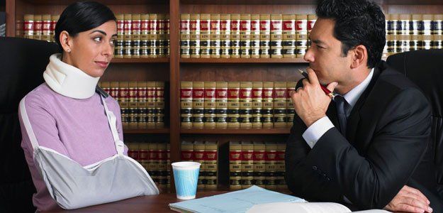lawyer with his injured client