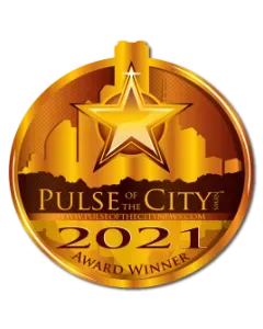 A gold medal that says pulse of the city 2021 award winner