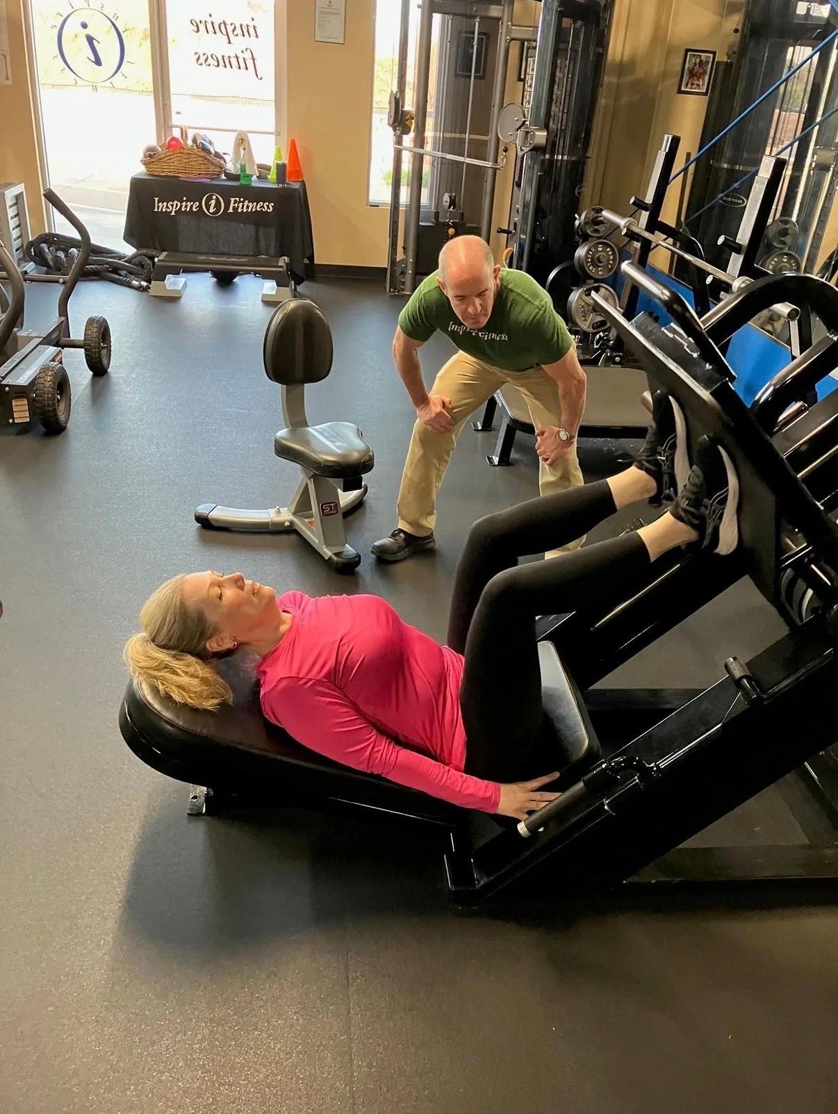 woman over 40 performing strength training in Cedar Park personal training gym