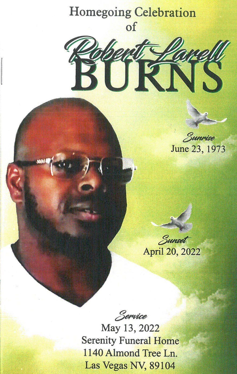 Memorial program for Robert Lowell Burns with portrait, doves, and dates June 13, 1952–April 20, 2022