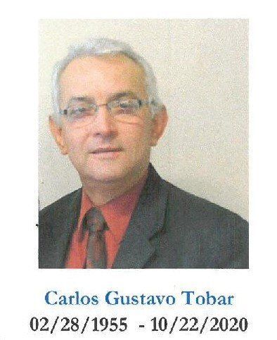Portrait of Carlos Gustavo Tobar in a dark suit, red shirt, and tie, with name and dates below.
