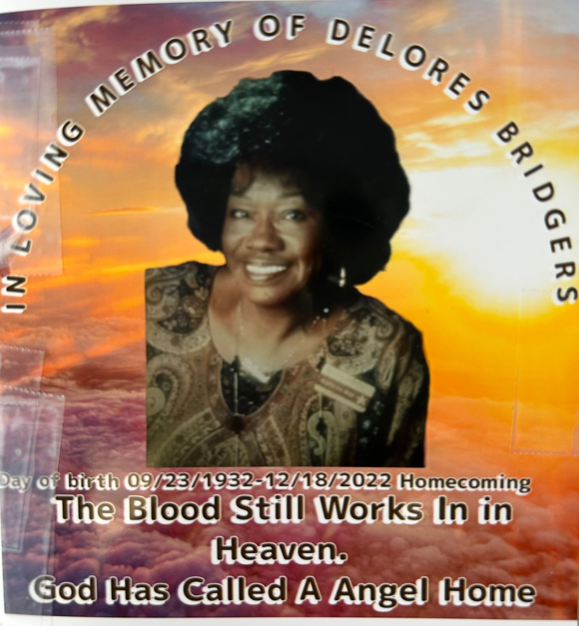 Memorial graphic with smiling portrait, sunset background, and text honoring Delores Bridgers in loving memory