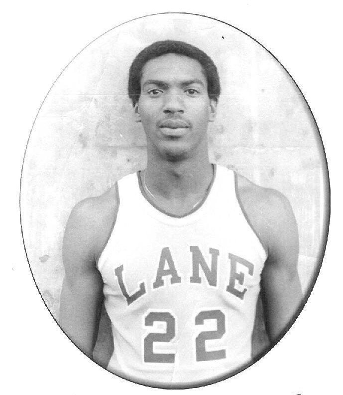 Portrait of a Lane basketball player wearing jersey number 22, posed against a plain backdrop