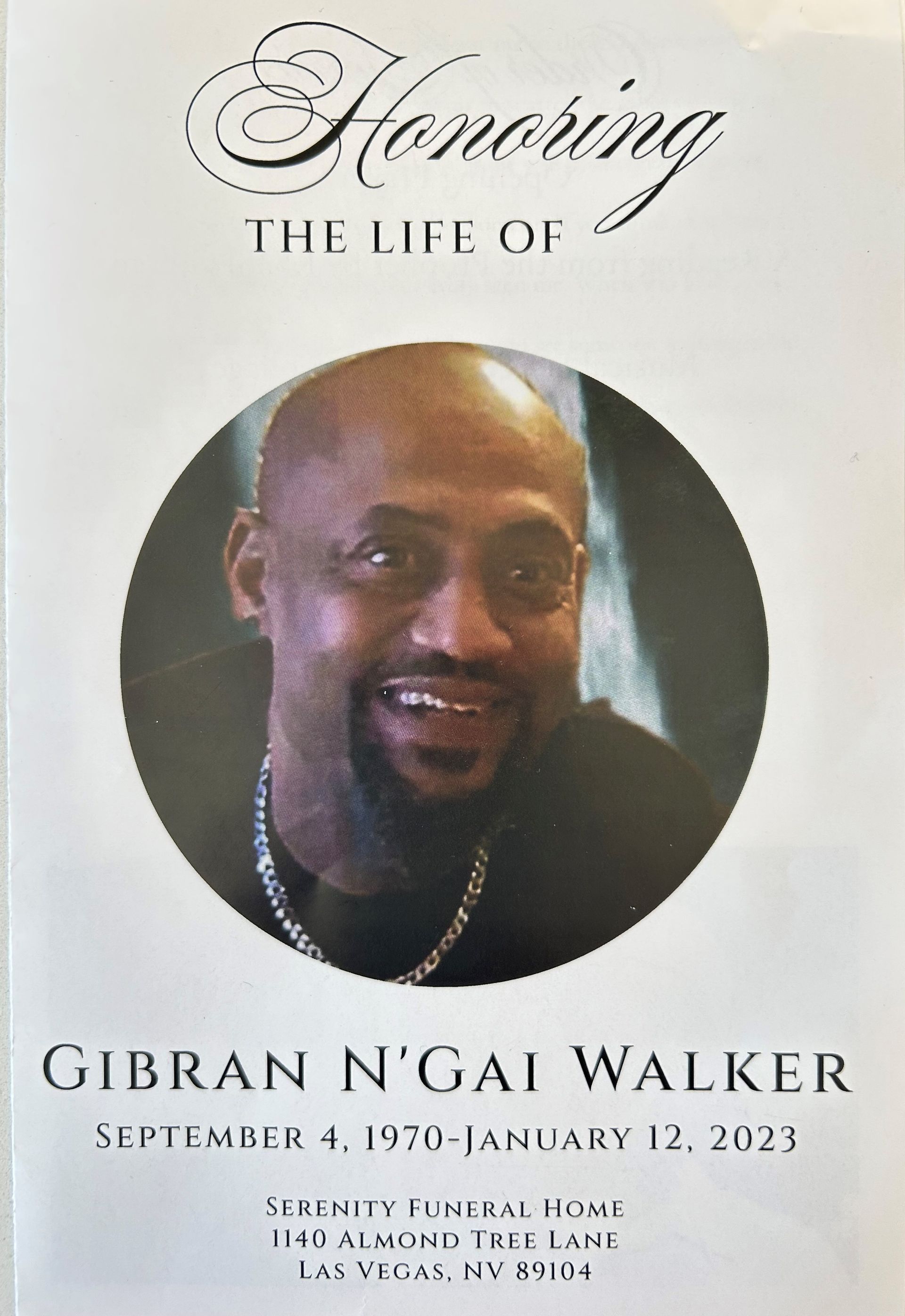 Memorial program cover with a smiling portrait and text honoring Gibran N’Gai Walker, September 1970–January 2, 2023