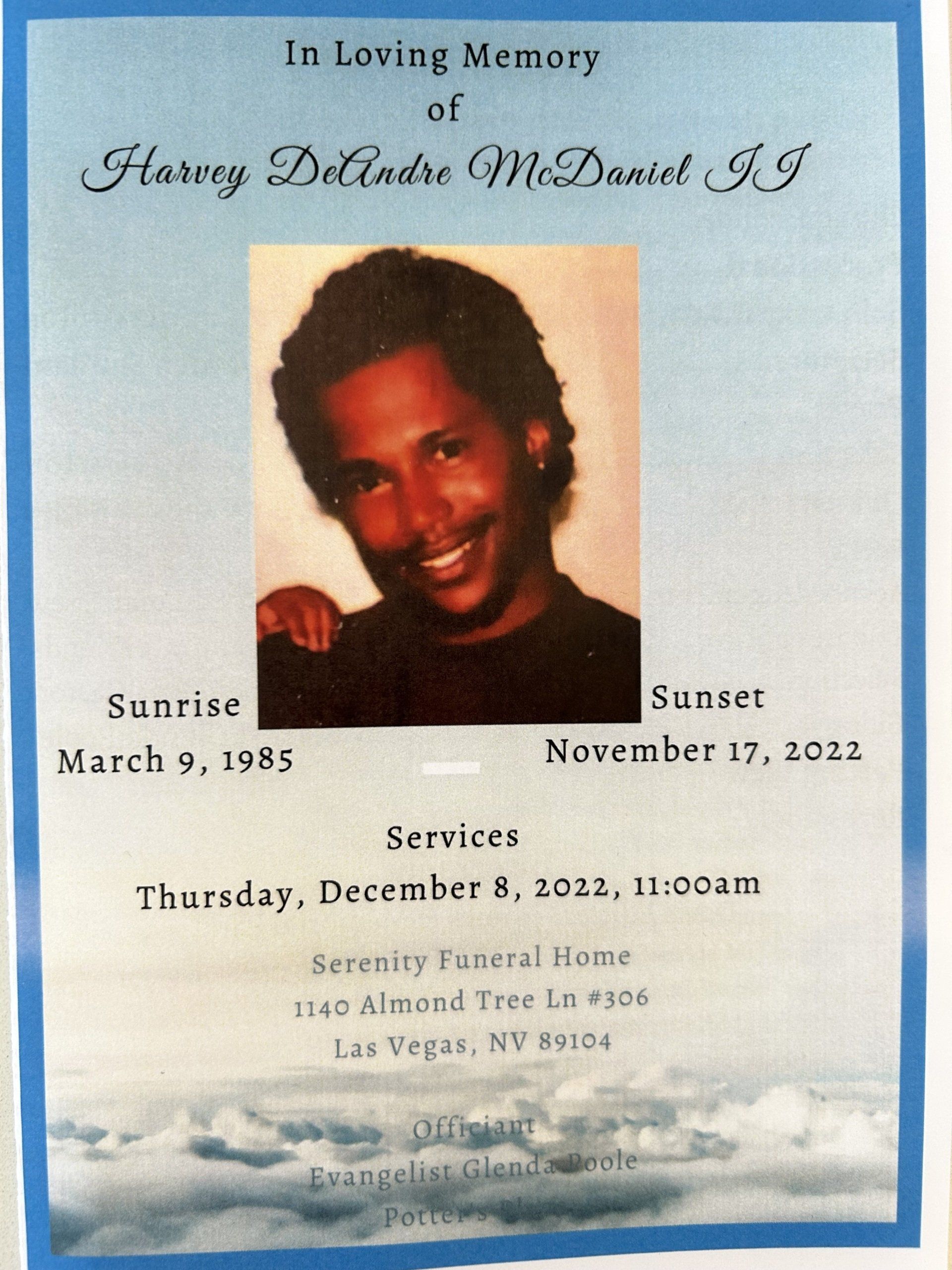 Memorial program with portrait, sky background, and service details for a loved one