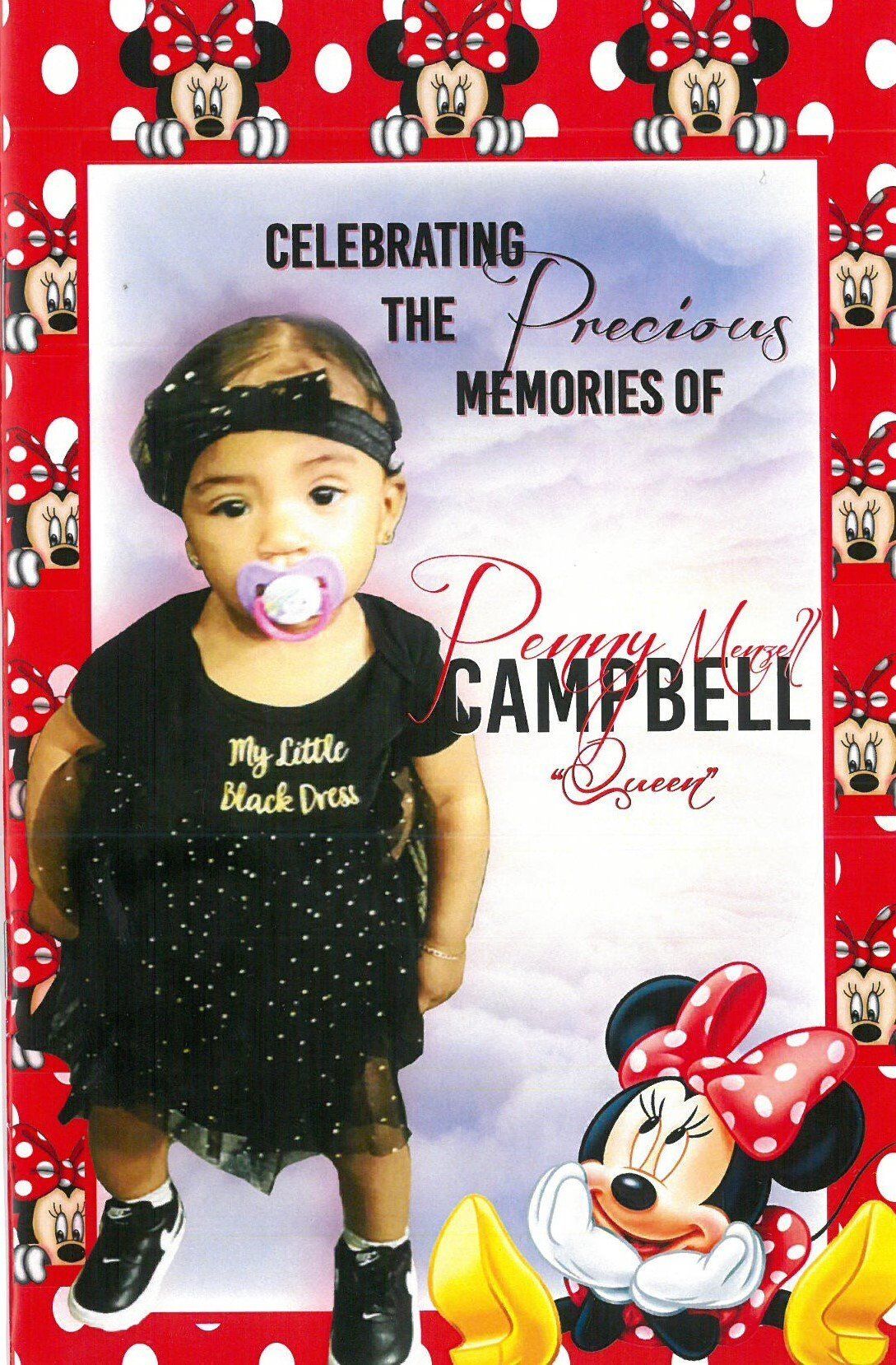 Baby with pacifier in black dress on Minnie Mouse-themed memorial cover with red polka-dot border.