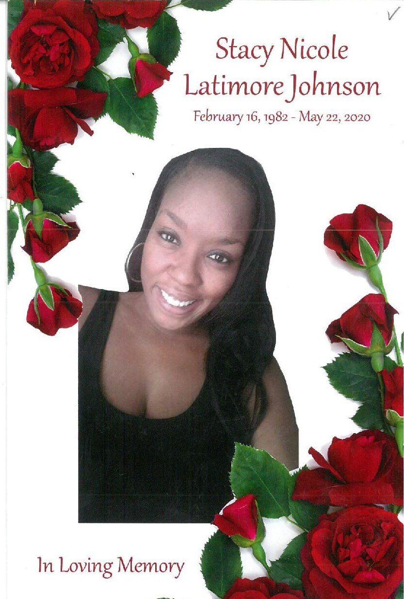 Memorial portrait of Stacy Nicole Latimore Johnson framed by red roses, with “In Loving Memory” text