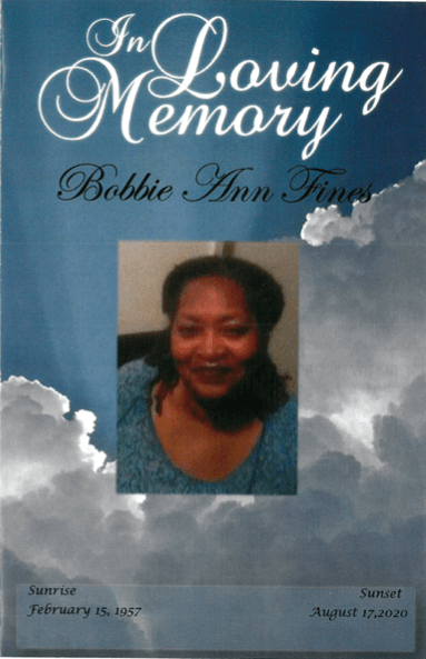 Memorial tribute cover with clouds, a portrait, and the title “In Loving Memory”