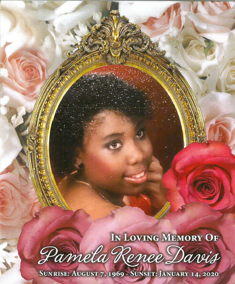 Memorial portrait in ornate gold frame with roses, reading “In Loving Memory of Pamela Renee Davis”