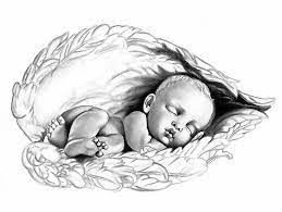 Sleeping baby in a soft white feather bed, curled beside a small teddy bear.