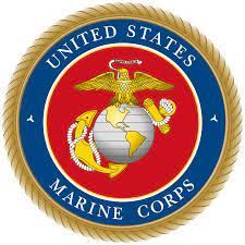 United States Marine Corps emblem with eagle, globe, and anchor on red and gold seal