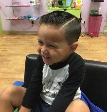 Child's hair cutting