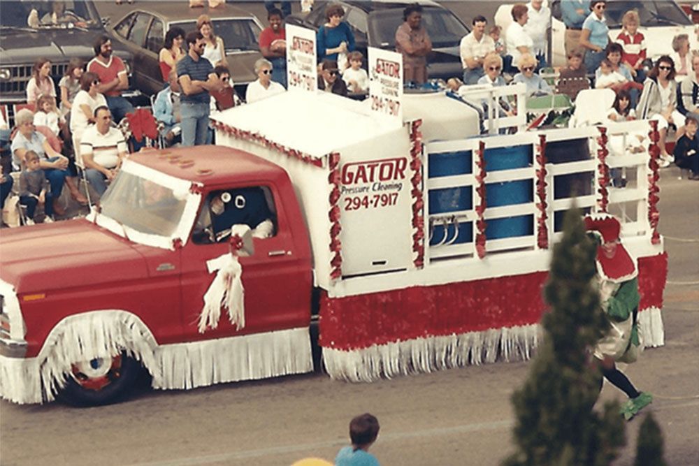Gator Pressure Cleaning & Custom Painting Inc.'s red truck