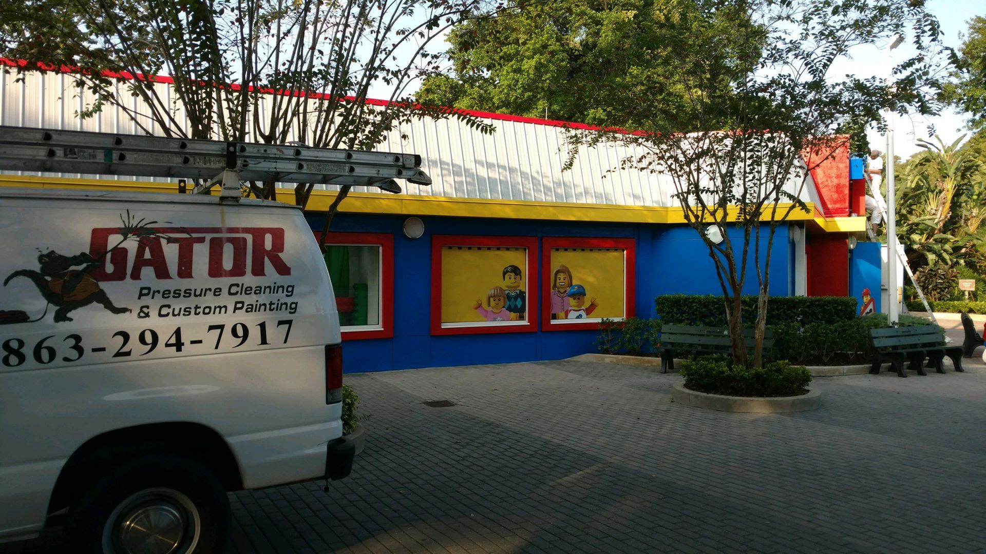 A gator van is parked in front of a building