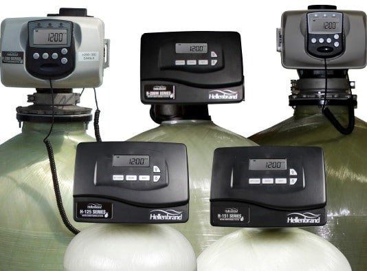 Five Hellenbrand water treatment systems with digital control valves displayed against a white background.