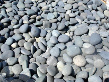 A pile of gray rocks sitting on top of each other