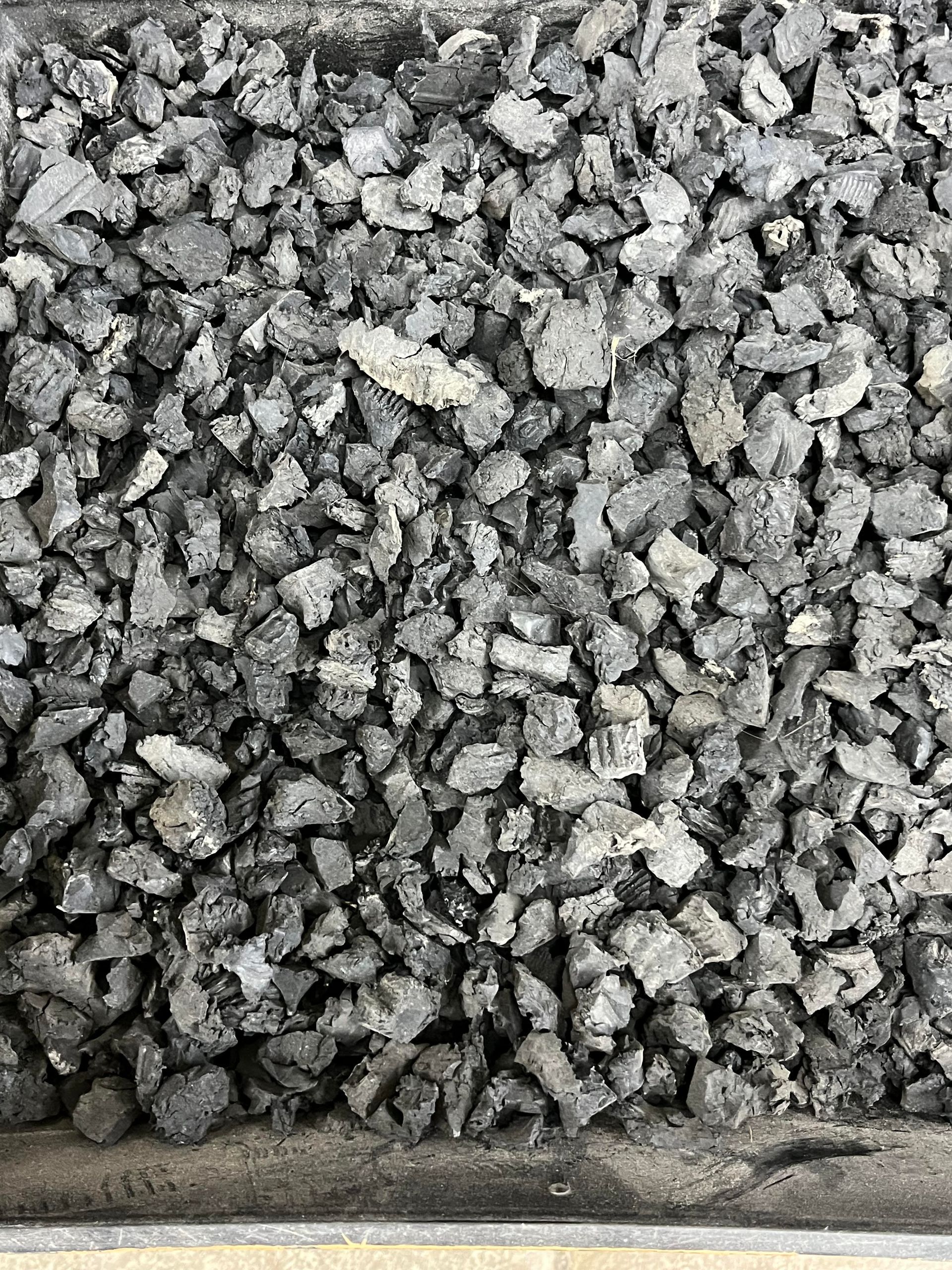 A black and white photo of a pile of rocks.