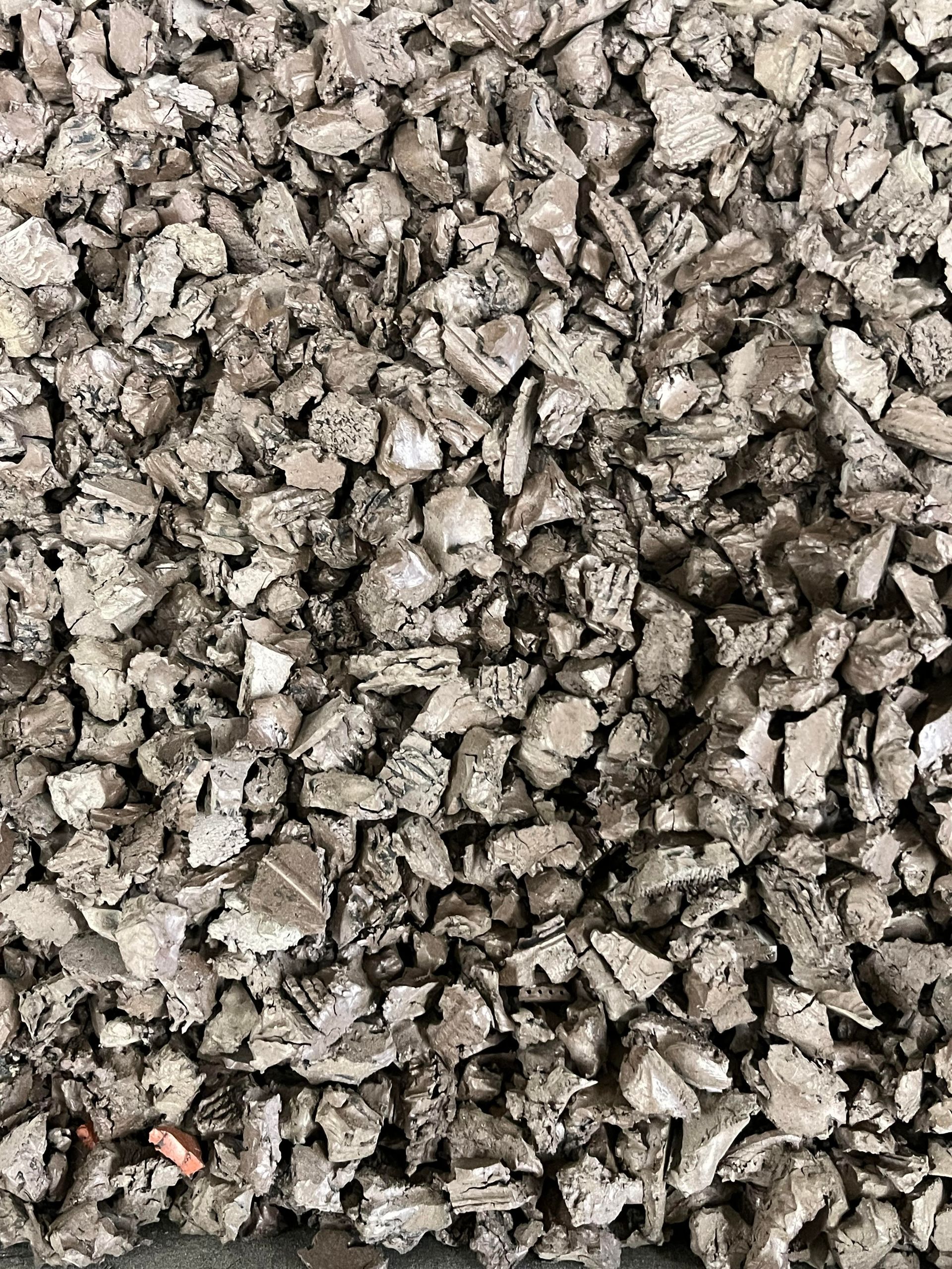 A pile of rocks sitting on top of each other on a table.