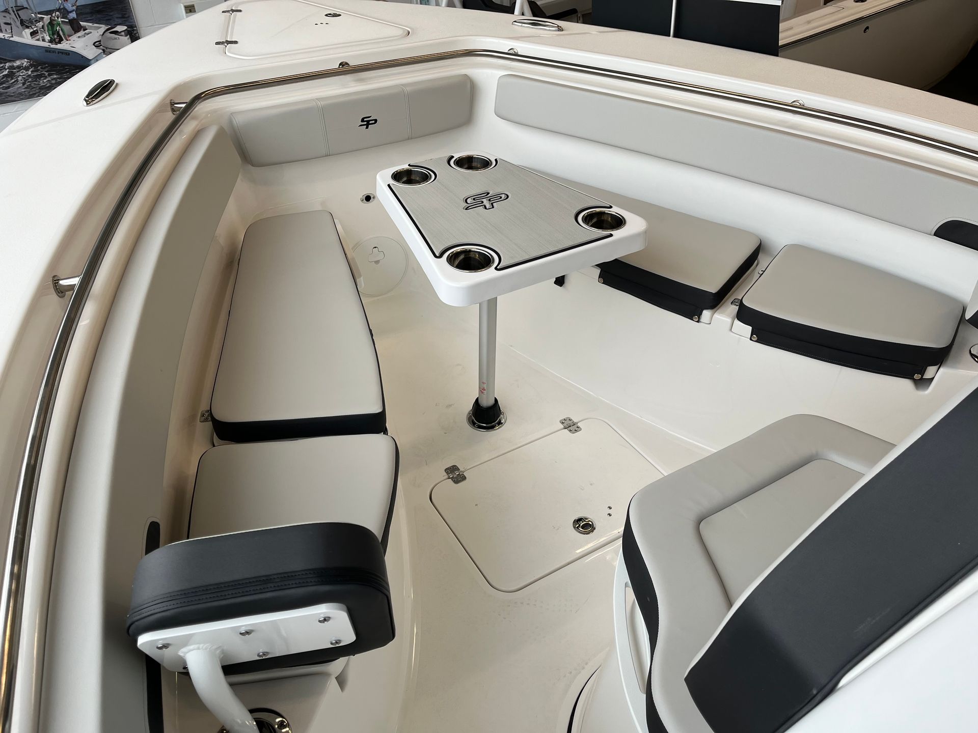 seats and a table in the front of the boat