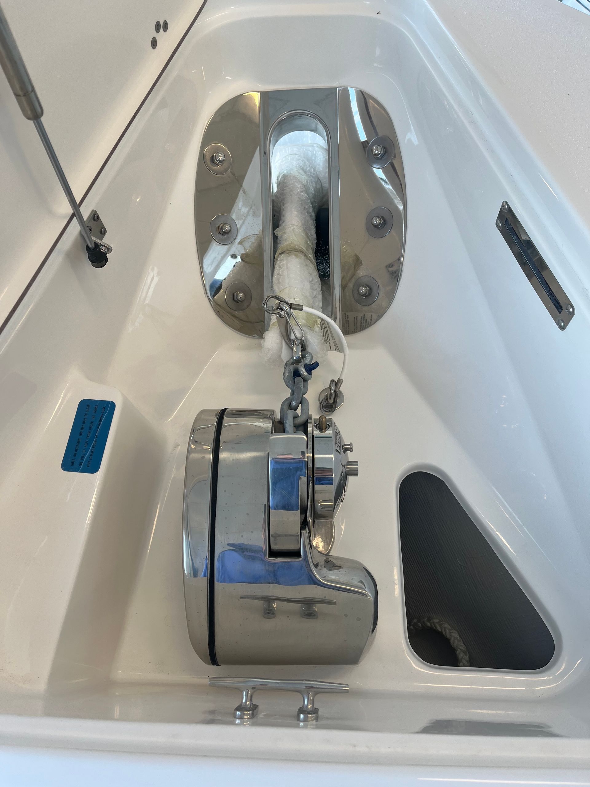 A close up of a stainless steel object on a boat