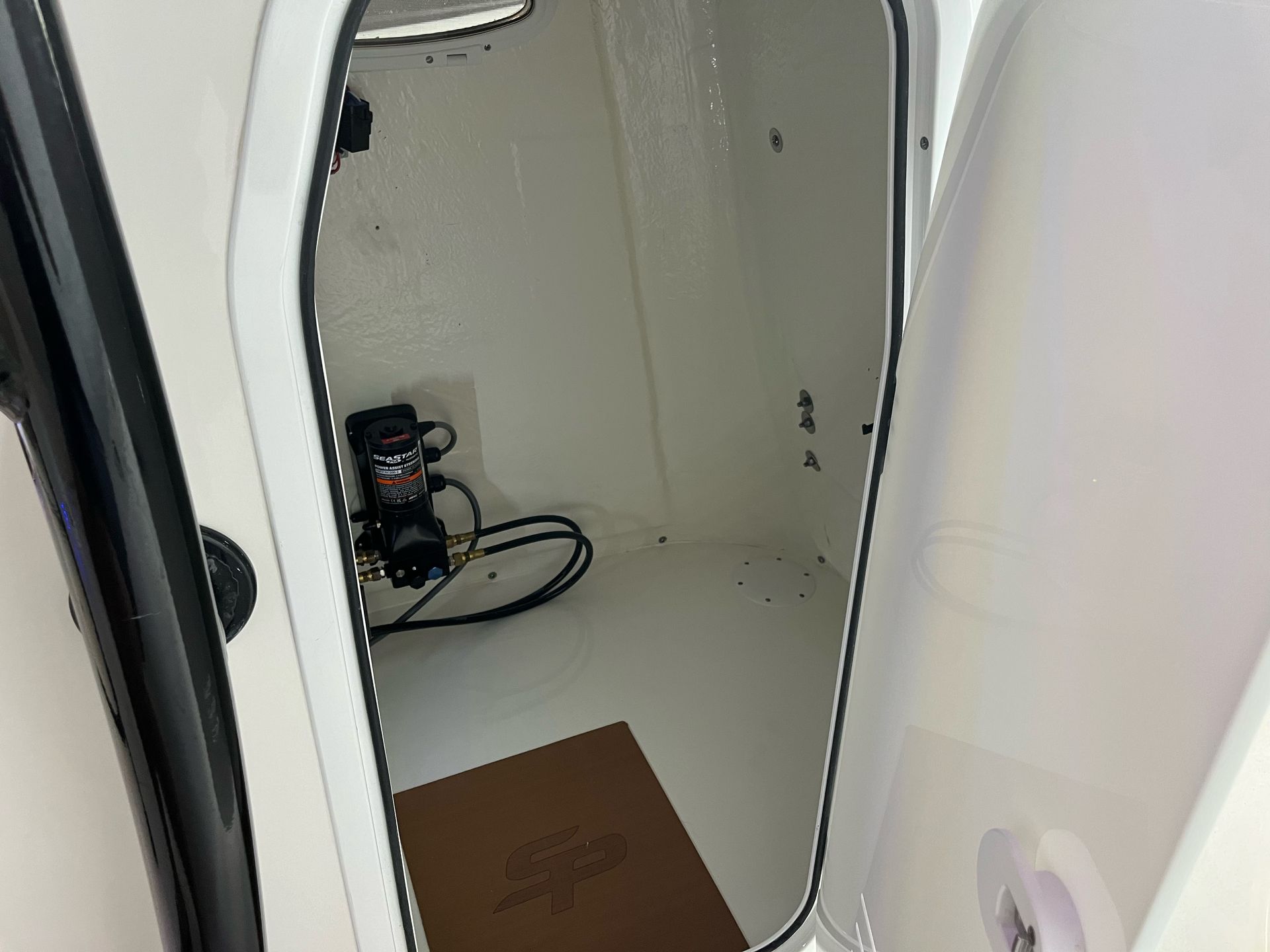 The inside of a boat with a door open
