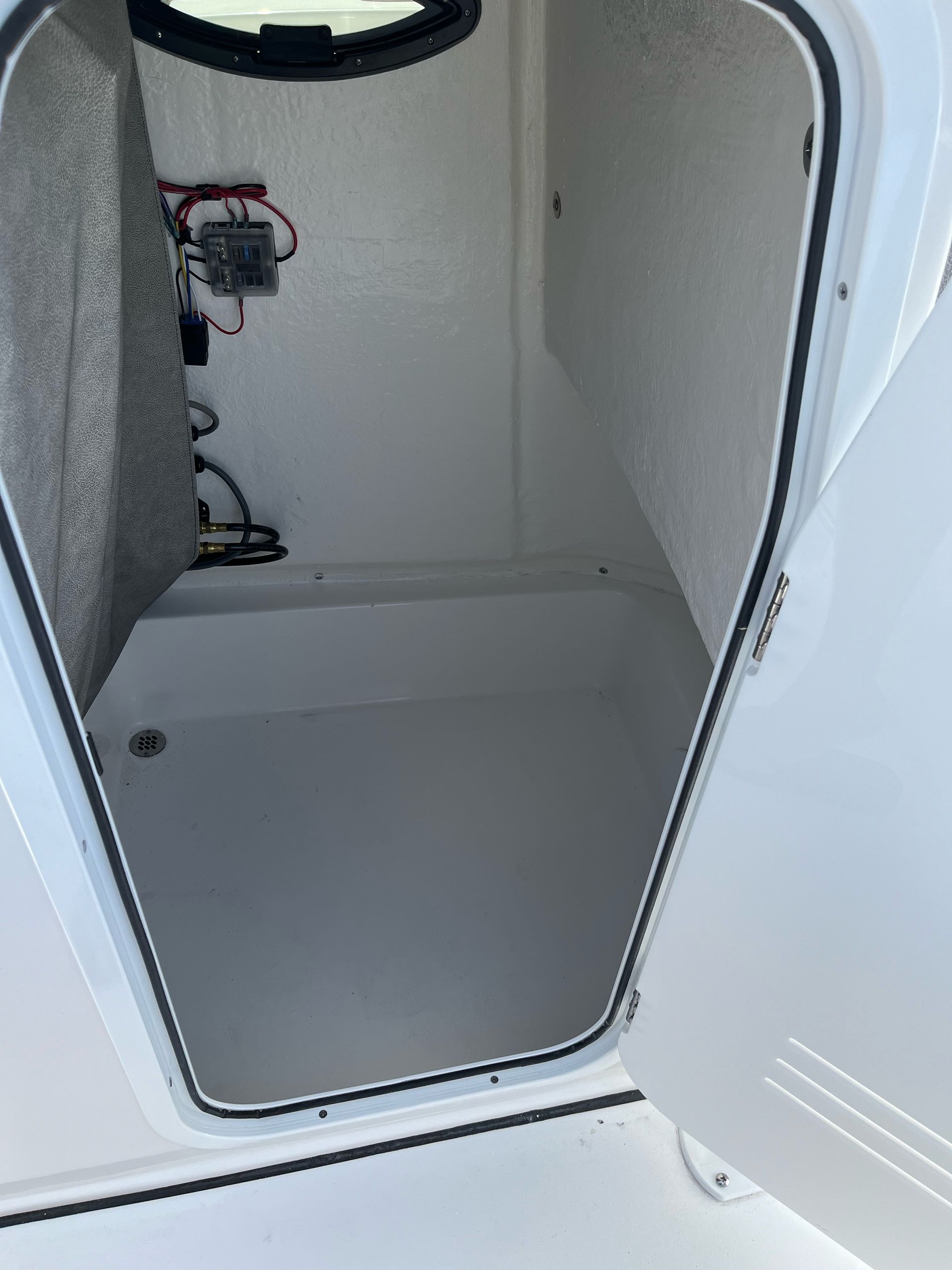 The inside of a boat with the door open
