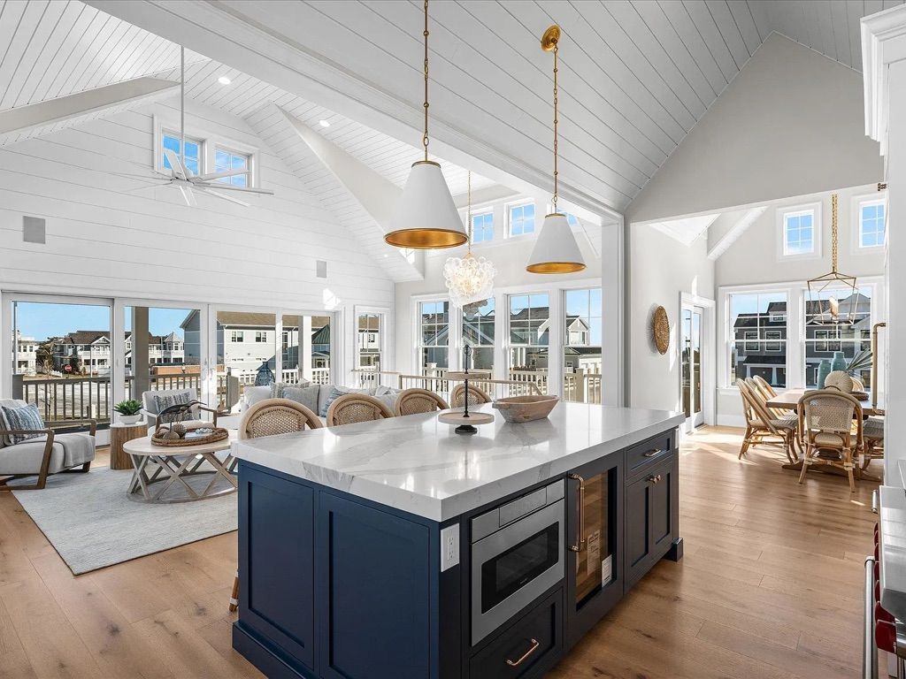 There is a large island in the middle of the kitchen.