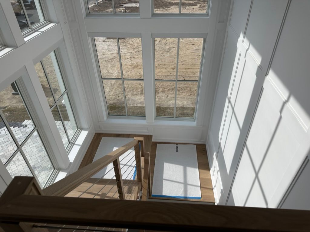 An aerial view of a house with lots of windows