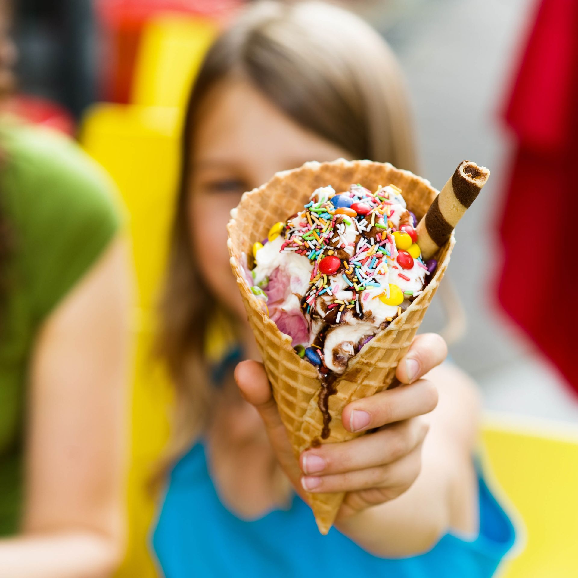 girl holding an ice cream cone