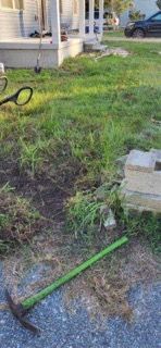 Preparing the lawn for a new walkway