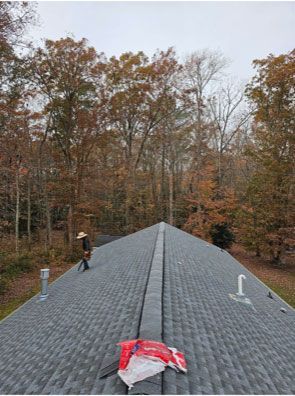 A man is working on the roof 